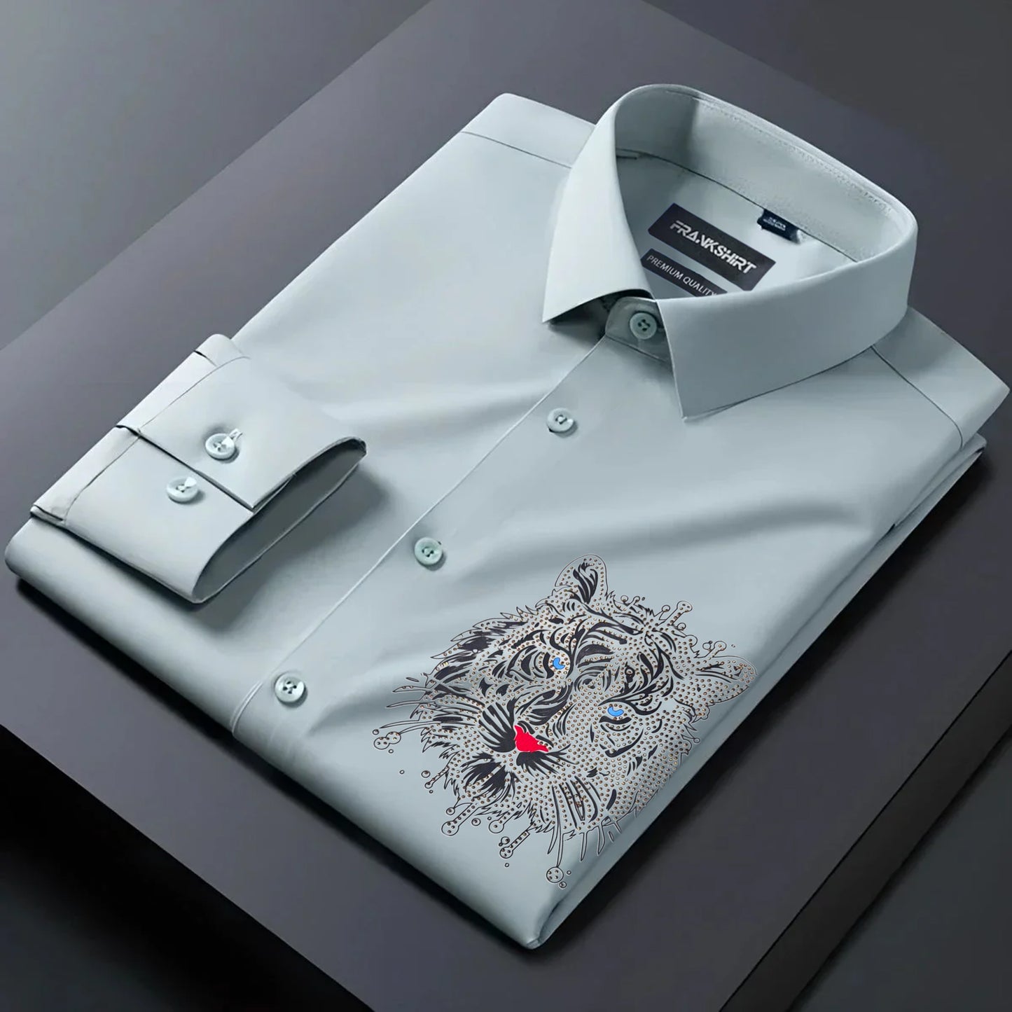 Light gray dress shirt with a tiger embroidery design on a dark surface