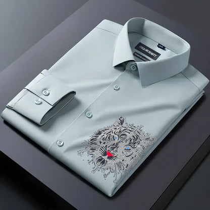 Light gray dress shirt with a tiger embroidery design on a dark surface