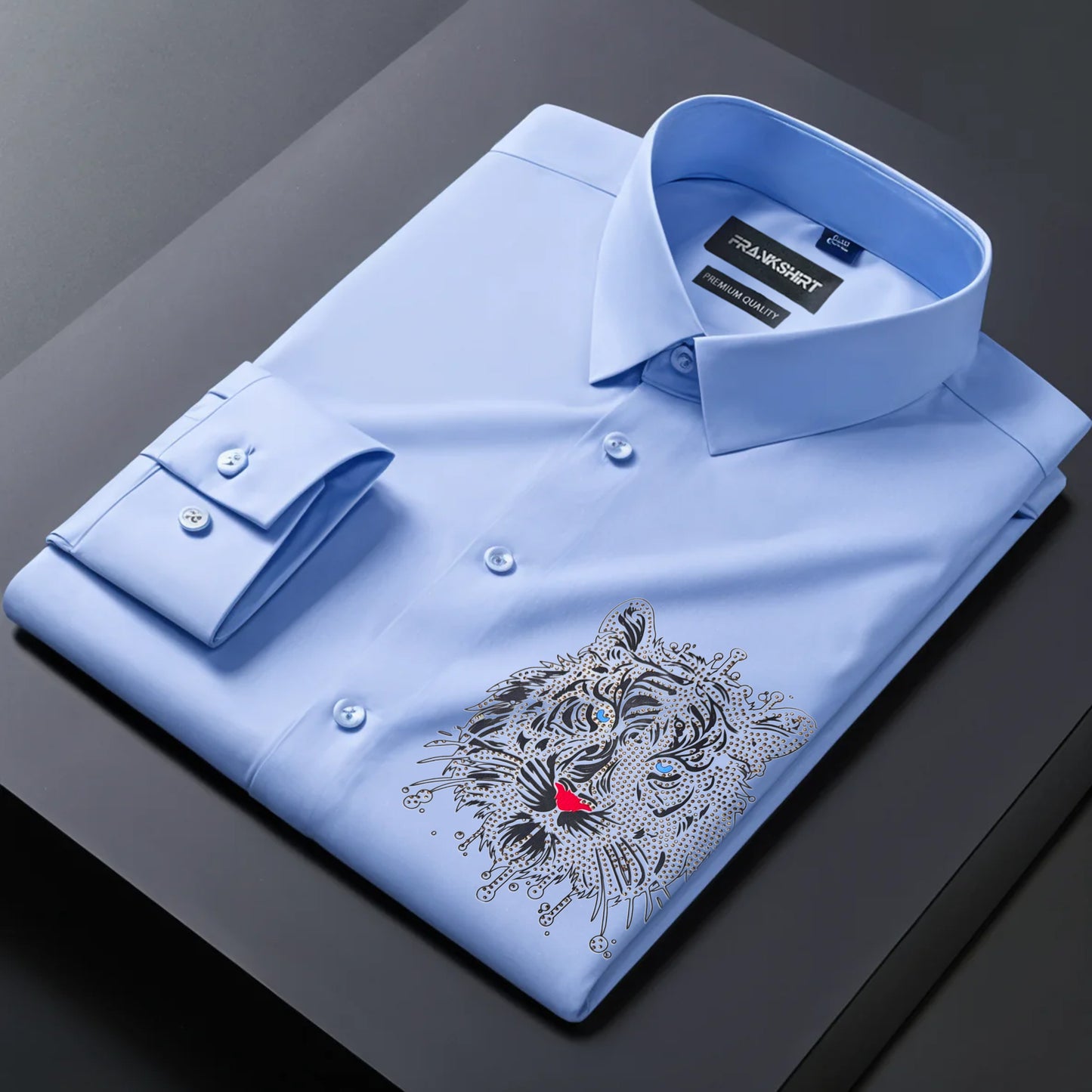 Light blue dress shirt with a tiger emblem on a dark surface