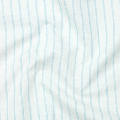 Close-up of fabric with light blue vertical stripes on a white background