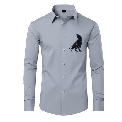 Gray shirt with a black lion emblem on a white background