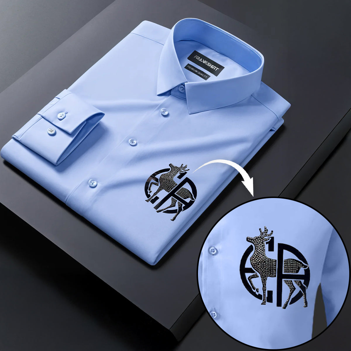 Light blue dress shirt with a deer logo on a dark background