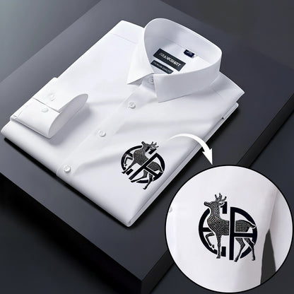 White dress shirt with a black logo on a dark surface