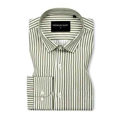 Folded green and white striped shirt with a label on a white background